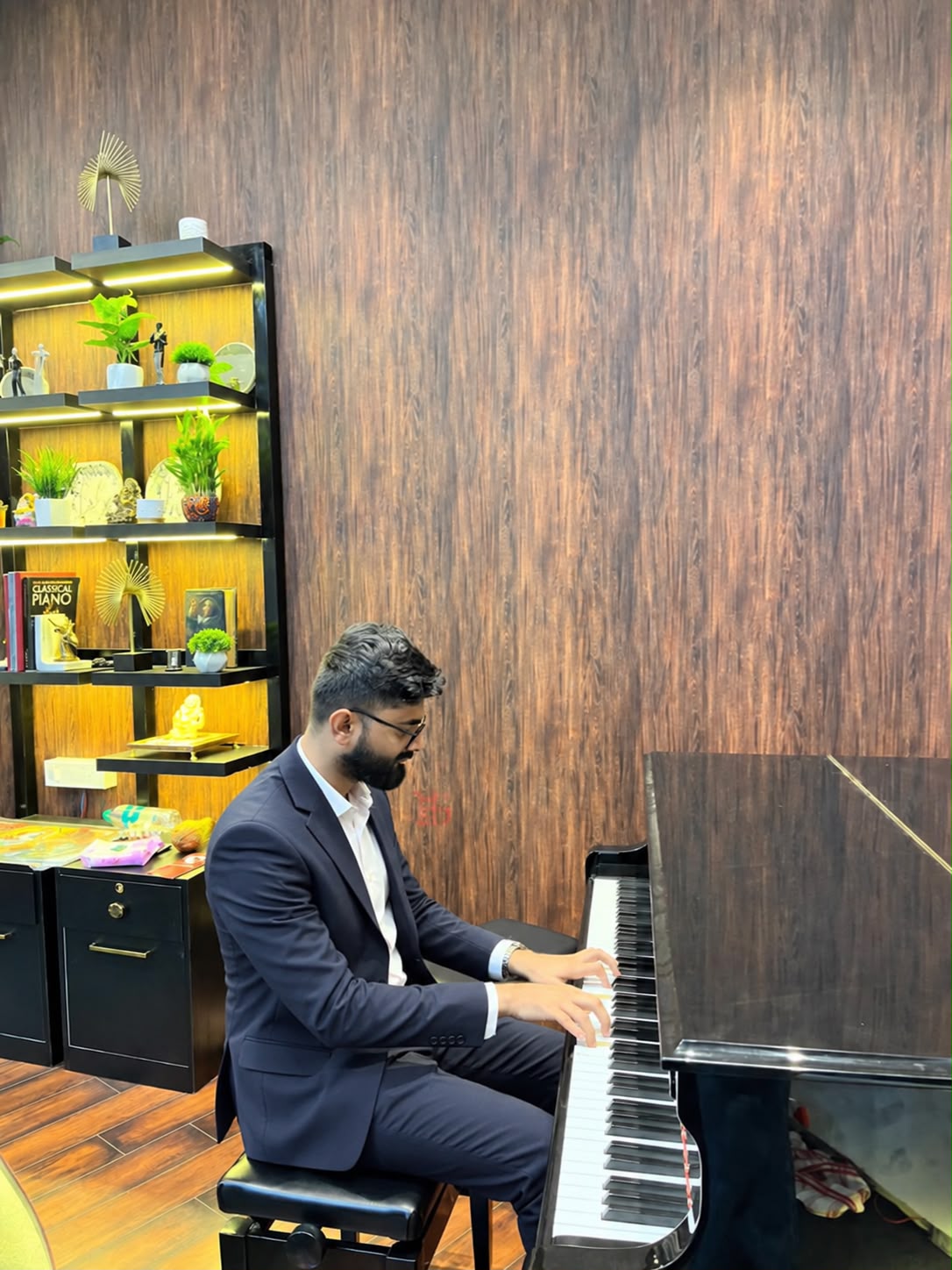 Vaishnav Bhandarkar playing the piano